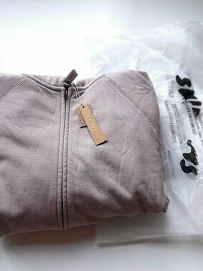 SKIMS  “relaxed french terry zip hoodie” in fawn